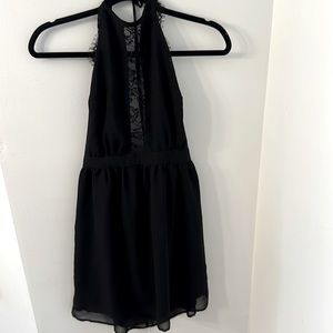 Backless halter black dress with lace accents
